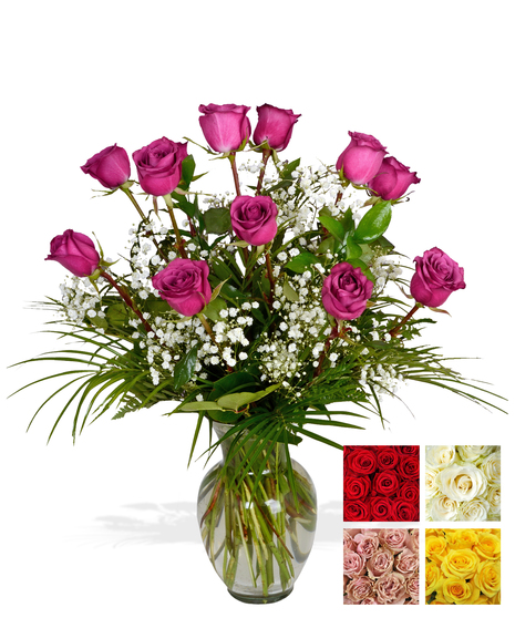 24 Beautiful long stem roses, Complete with greenery & baby's breath and designed in a glass vase.