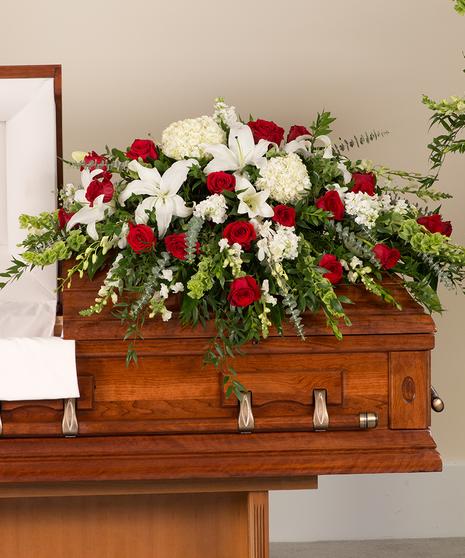 Red and White Tradition casket cover delivered in Baton Rouge, LA. 