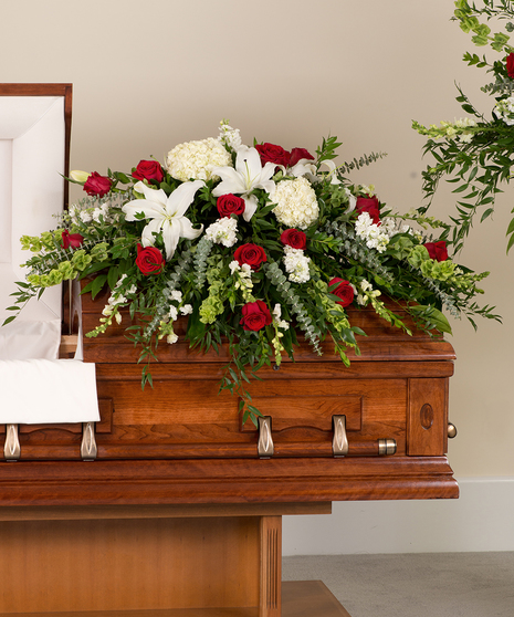 Red and White Tradition casket cover delivered in Baton Rouge, LA. 