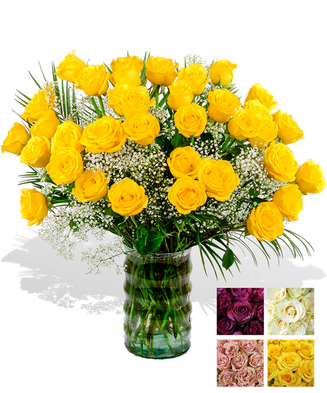 24 Beautiful long stem roses, Complete with greenery & baby's breath and designed in a glass vase.