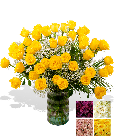 24 Beautiful long stem roses, Complete with greenery & baby's breath and designed in a glass vase.