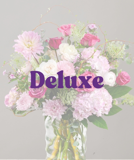 Belle Flower Arrangement: A stunning arrangement of roses, DAHLIAS , and hydrangeas in an elegant vase