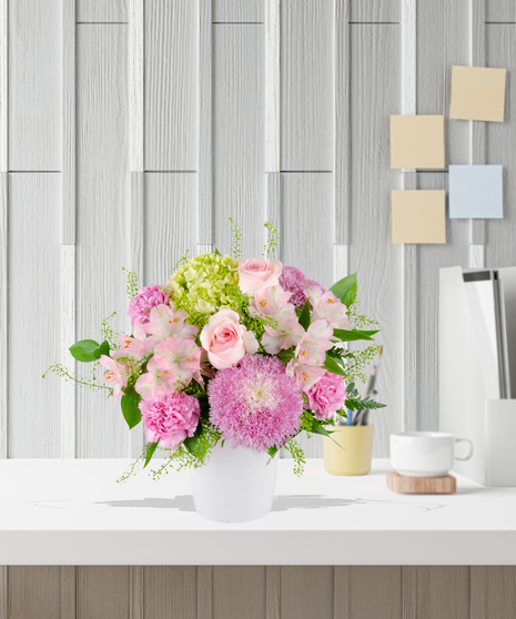 Blooms for Mom Flower Arrangement: A classy mix of pink and green flowers  in a beautiful vase
