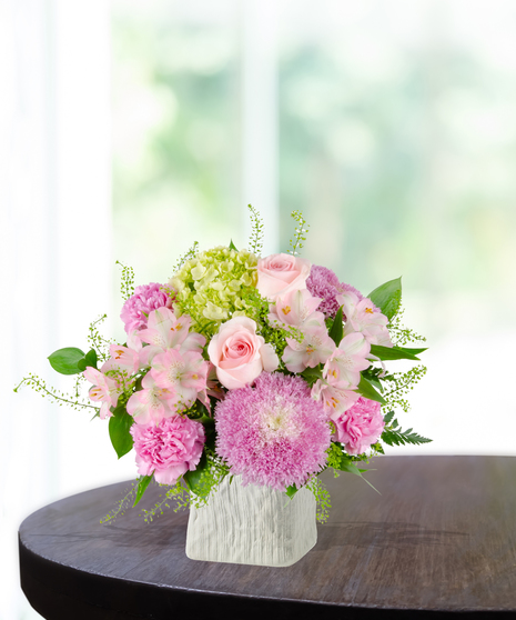 Blooms for Mom Flower Arrangement: A classy mix of pink and green flowers  in a beautiful vase