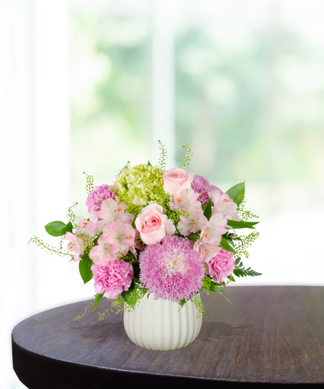 Blooms for Mom Flower Arrangement: A classy mix of pink and green flowers  in a beautiful vase
