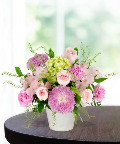 Blooms for Mom Flower Arrangement: A classy mix of pink and green flowers  in a beautiful vase