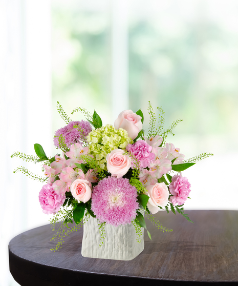 Blooms for Mom Flower Arrangement: A classy mix of pink and green flowers  in a beautiful vase