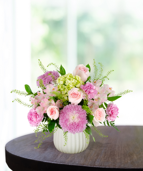 Blooms for Mom Flower Arrangement: A classy mix of pink and green flowers  in a beautiful vase