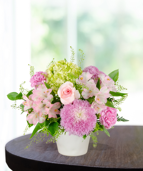 Blooms for Mom Flower Arrangement: A classy mix of pink and green flowers  in a beautiful vase