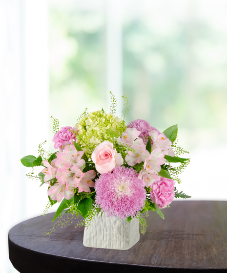 Blooms for Mom Flower Arrangement: A classy mix of pink and green flowers  in a beautiful vase
