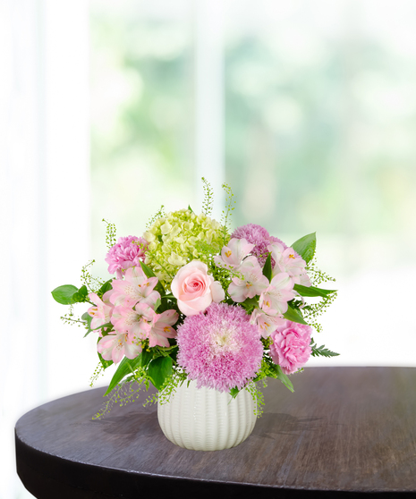 Blooms for Mom Flower Arrangement: A classy mix of pink and green flowers  in a beautiful vase