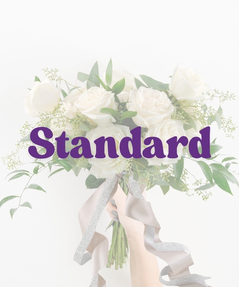 Diamond Dust handheld bouquet with white roses, greenery, and silver satin and glitter ribbon