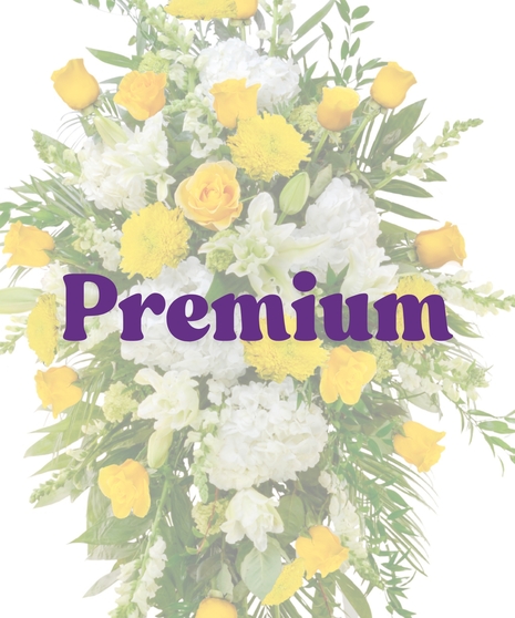 Yellow and white standing spray with roses, mums, and hydrangeas on an easel from Billy Heroman’s