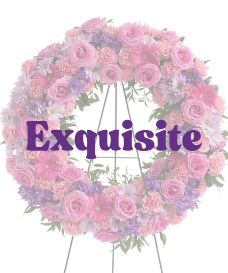 Feminine Funeral Wreath with pink roses, carnations, purple daisies, stock, and gerbera on a standing easel