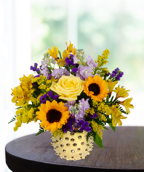yellow roses, sunflowers, purple stock, purple statice, solidago,  delivered in  Baton Rouge, LA Billy Heroman's