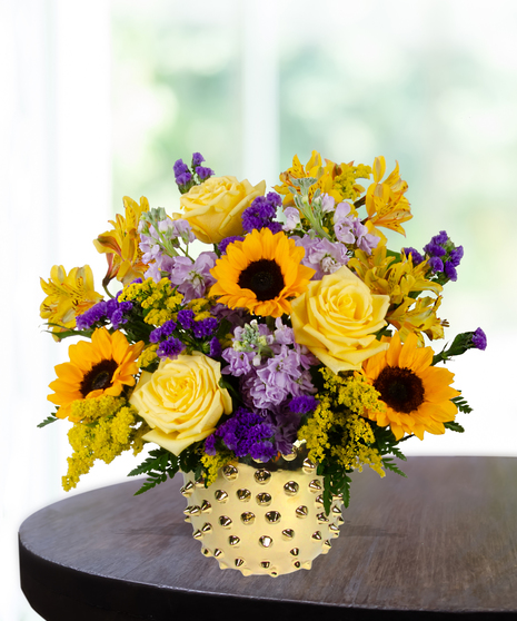 yellow roses, sunflowers, purple stock, purple statice, solidago,  delivered in  Baton Rouge, LA Billy Heroman's
