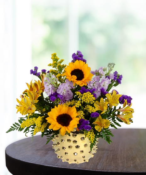 yellow roses, sunflowers, purple stock, purple statice, solidago,  delivered in  Baton Rouge, LA Billy Heroman's