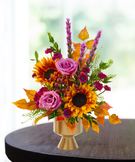 Geaux Gold LSU-inspired flower arrangement featuring gold and purple blooms by Billy Heroman’s in Baton Rouge, La