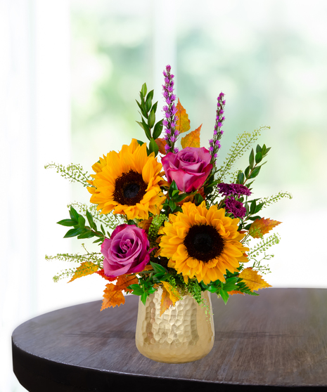 Geaux Gold LSU-inspired flower arrangement featuring gold and purple blooms by Billy Heroman’s in Baton Rouge, La