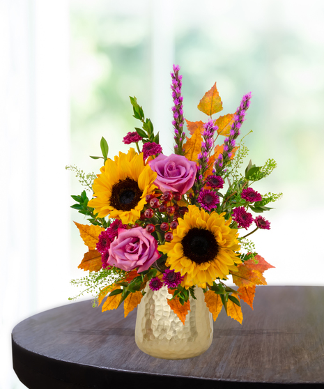 Geaux Gold LSU-inspired flower arrangement featuring gold and purple blooms by Billy Heroman’s in Baton Rouge, La