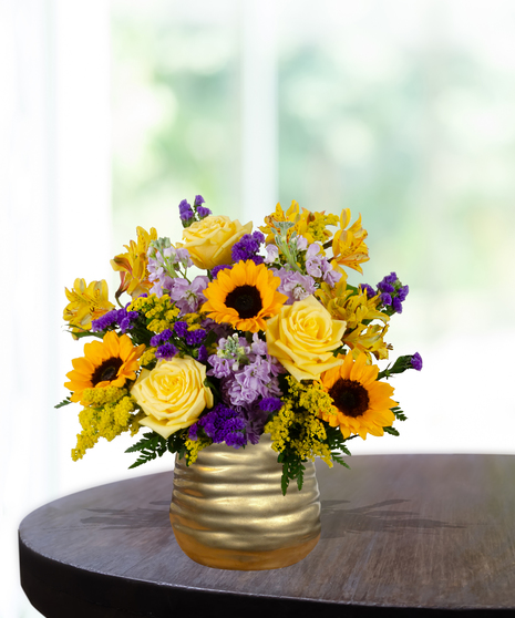 yellow roses, sunflowers, purple stock, purple statice, solidago,  delivered in  Baton Rouge, LA Billy Heroman's