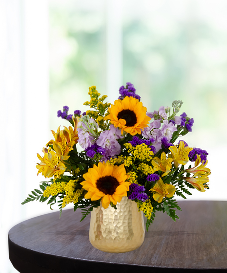 yellow roses, sunflowers, purple stock, purple statice, solidago,  delivered in  Baton Rouge, LA Billy Heroman's