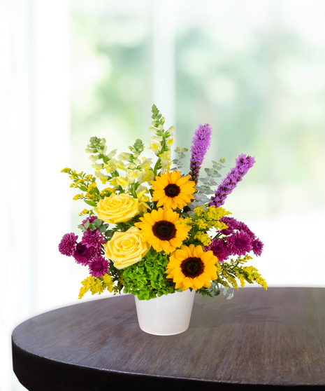 yellow roses, sunflowers, purple pom poms, purple liatris, yellow snapdragons, green hydrangea delivered in  Baton Rouge, LA Billy Heroman's