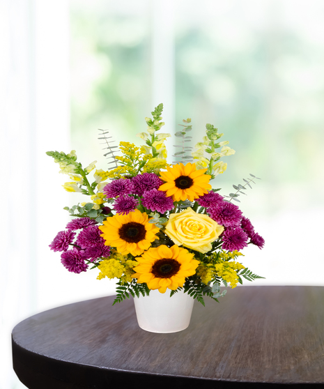 yellow roses, sunflowers, purple pom poms, purple liatris, yellow snapdragons, green hydrangea delivered in  Baton Rouge, LA Billy Heroman's