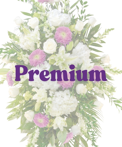 Lavender and white standing spray with roses, hydrangeas, and Fuji mums on easel from Billy Heroman’s