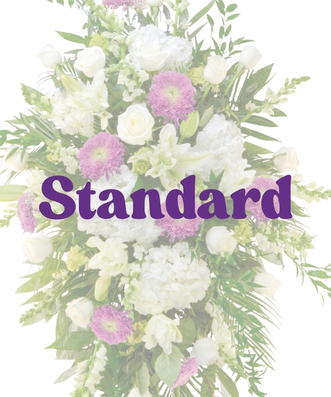 Lavender and white standing spray with roses, hydrangeas, and Fuji mums on easel from Billy Heroman’s