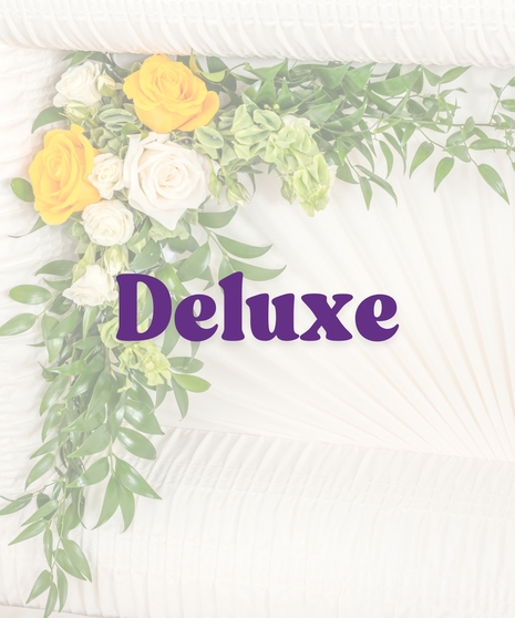 Yellow and white rose floral accent for inside casket lid with greenery from Billy Heroman’s in Baton Rouge