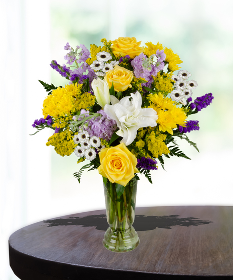purple and yellow flowers lsu arrangement yellow roses, lavender stock, purple statice, white lily rose delivered same day in Baton Rouge, LA from Billy Heroman's 