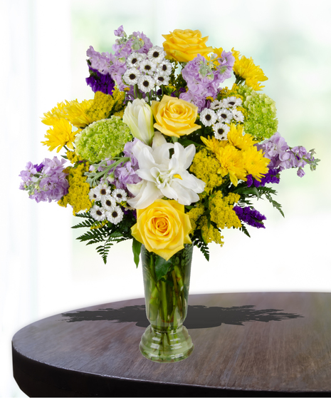 purple and yellow flowers lsu arrangement yellow roses, lavender stock, purple statice, white lily rose delivered same day in Baton Rouge, LA from Billy Heroman's 