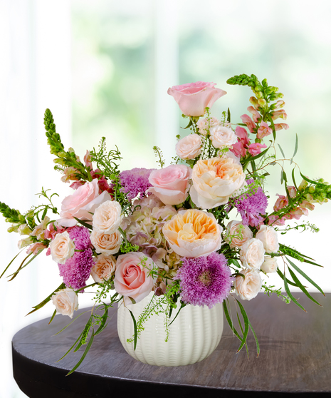 Opal Crush October birthday flower arrangement inspired by the opal birthstone with soft pastel blooms from Billy Heroman’s florist in Baton Rouge.