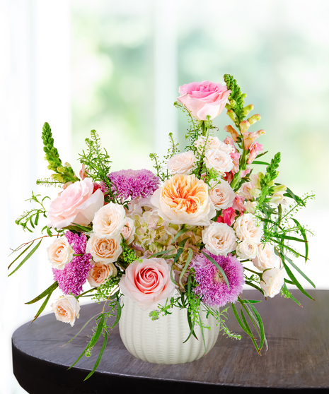 Opal Crush October birthday flower arrangement inspired by the opal birthstone with soft pastel blooms from Billy Heroman’s florist in Baton Rouge.