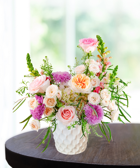 Opal Crush October birthday flower arrangement inspired by the opal birthstone with soft pastel blooms from Billy Heroman’s florist in Baton Rouge.