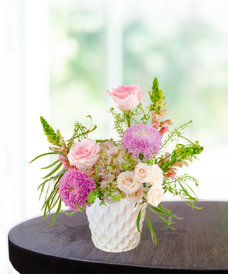 Opal Crush October birthday flower arrangement inspired by the opal birthstone with soft pastel blooms from Billy Heroman’s florist in Baton Rouge.