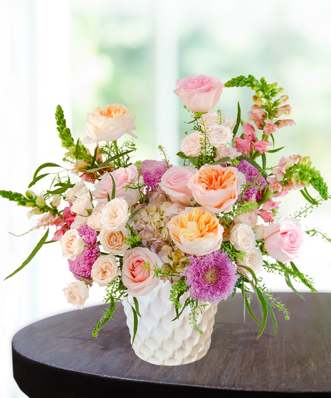 Opal Crush October birthday flower arrangement inspired by the opal birthstone with soft pastel blooms from Billy Heroman’s florist in Baton Rouge.