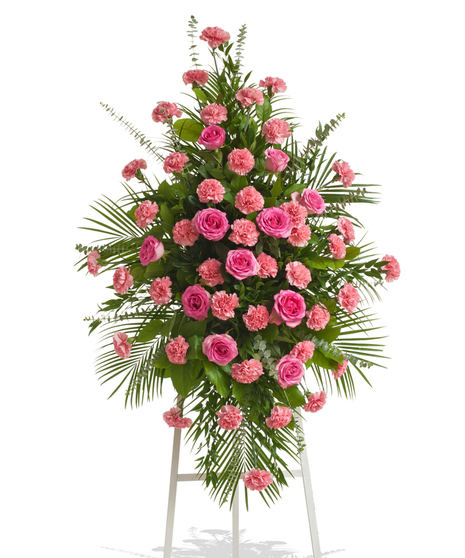 Roses & Carnations Funeral Stand with pink roses, pink carnations, greenery, and eucalyptus on a white easel