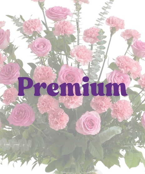 Roses & Carnations Vase Arrangement with pink roses, pink carnations, eucalyptus, and greenery in a clear glass vase