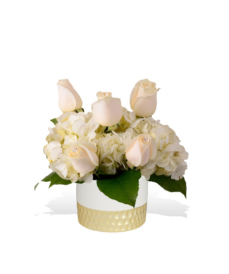Flowers arranged in a diamond accented vase delivered in Baton Rouge