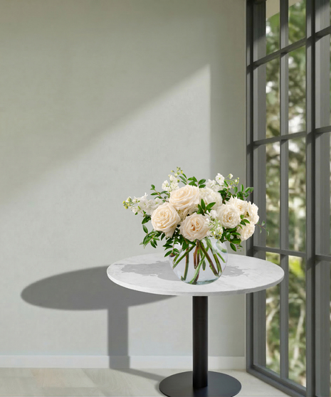 All-white floral arrangement of roses, hydrangea, and stock in a glass vase – Tranquility from Billy Heroman’s