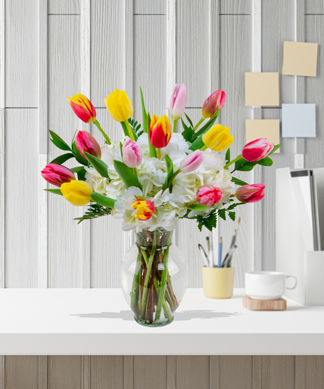Multicolored tulips and white hydrangea arrangement - Delivered in Baton Rouge by Billy Heroman's