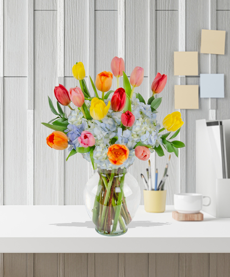 Tulip Treasures Flower Arrangement for Mother's Day: A stunning display of vibrant tulips in a chic vase