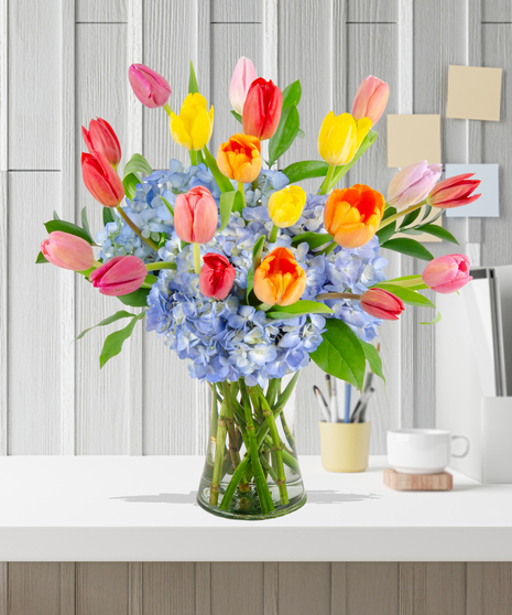 Tulip Treasures Flower Arrangement for Mother's Day: A stunning display of vibrant tulips in a chic vase