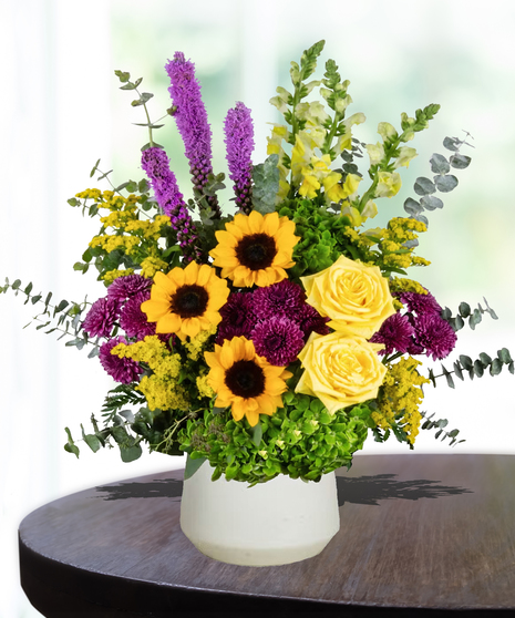 yellow roses, sunflowers, purple pom poms, purple liatris, yellow snapdragons, green hydrangea delivered in  Baton Rouge, LA Billy Heroman's