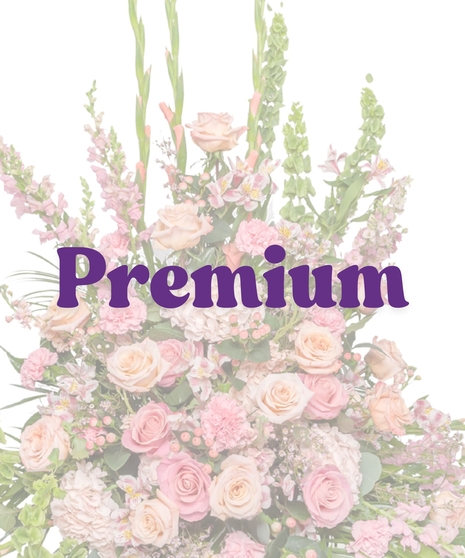 Pink floral urn arrangement with roses and snapdragons designed for head or foot of casket – Tender Blush Funeral Suite