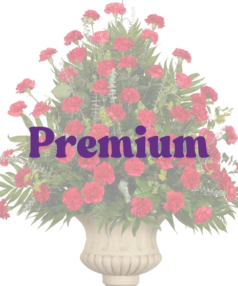 Classic Carnations Urn Arrangement with red carnations and greenery from Billy Heroman’s in Baton Rouge, LA – also available in white, pink, lavender, or yellow
