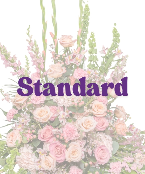 Pink floral urn arrangement with roses and snapdragons designed for head or foot of casket – Tender Blush Funeral Suite