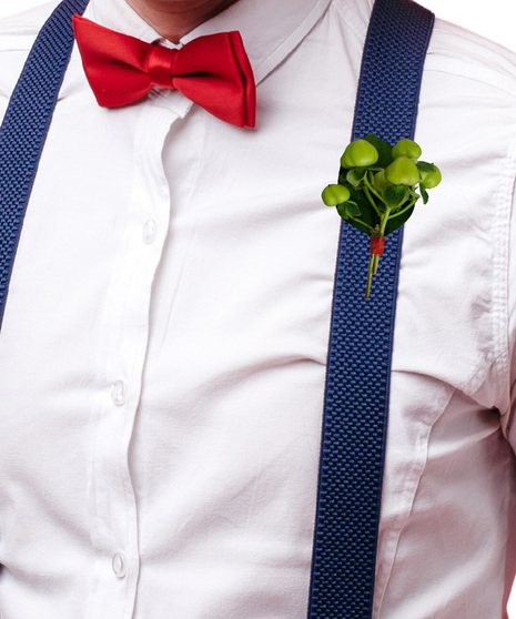 A simple green boutonniere with seeded eucalyptus.